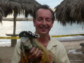 Gary Coles with iguana in Mexico – Best Places In The World To Retire – International Living