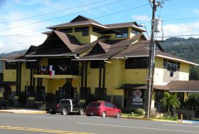 Yellow house on the road in Boquete, Panama – Best Places In The World To Retire – International Living