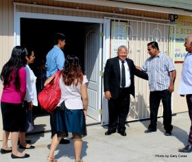 Pastor Rafael Gomez welcoming people to church – Best Places In The World To Retire – International Living