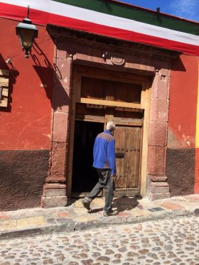 Chuck Bolotin walking on a street in San Miguel de Allende – Best Places In The World To Retire – International Living