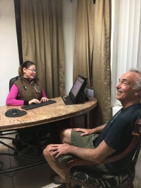 Chuck Bolotin in consult with doctor in Ajijic, Mexico – Best Places In The World To Retire – International Living