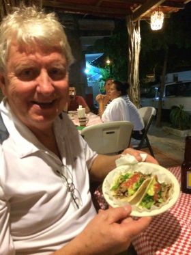 Man eating a taco in Nayarit, just north of Puerto Vallarta, Mexico – Best Places In The World To Retire – International Living