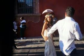 Bride and groom walking the streets of San Miguel de Allende, Mexico – Best Places In The World To Retire – International Living