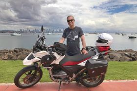 Expat Christophe Frochaux  with his bike, Panama City, Panama – Best Places In The World To Retire – International Living