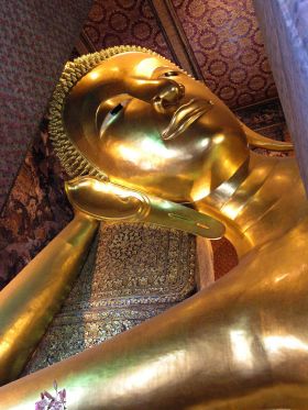 Reclining golden Buddha in Thailand – Best Places In The World To Retire – International Living
