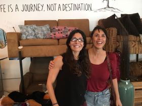 Magy Cardona (right) shows Jet Metier of Best Places in the World to Retire, some furniture options at her resale store Make It Cash, Ajijic, Mexico – Best Places In The World To Retire – International Living