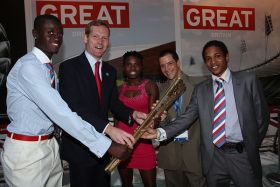 Foreign Office Minister Jeremy Browne with the Belize Olympic team Kenneth Medwood, Kaina Martinez and Eddermys Sanchez – Best Places In The World To Retire – International Living