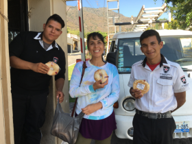 Jet Metier of Best Places in the World to Retire giving seasonal pastry to the security guards, Lake Chapala, Mexico – Best Places In The World To Retire – International Living