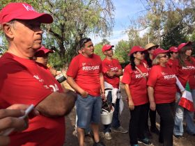 Keller William volunteers gather to earase graffiti in San Miguel de Allended, Mexico – Best Places In The World To Retire – International Living