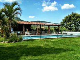 Pool and barbecue terrace at Hotel Perico, Ajijic, Mexico – Best Places In The World To Retire – International Living