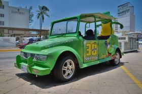 Taxi with an advertisement for Senior Frog, Mazatlan, Mexico – Best Places In The World To Retire – International Living