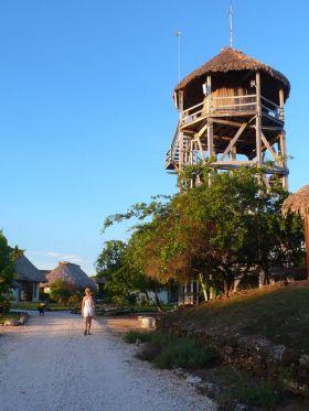 The water tower and guest houses at Crimson Orchid Inn, near Corozal, Belize – Best Places In The World To Retire – International Living
