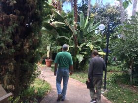 Ben White and Chuck Bolotin walk the grounds of Lake Chapala Society LCS