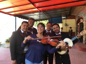 Jet Metier plays the violin at the quinceanera in Ajijic, Mexico