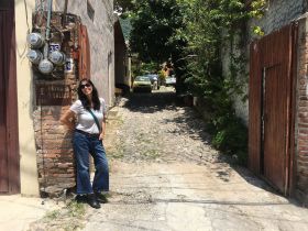 Jet Metier standing next to a CFE pole in Mexico