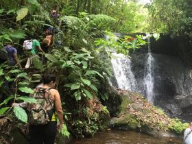 Hikers along a waterfall and stream in Nicaragua,  – Best Places In The World To Retire – International Living