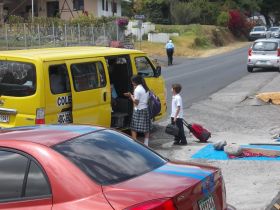 Road in Boquete with a van and people getting in – Best Places In The World To Retire – International Living